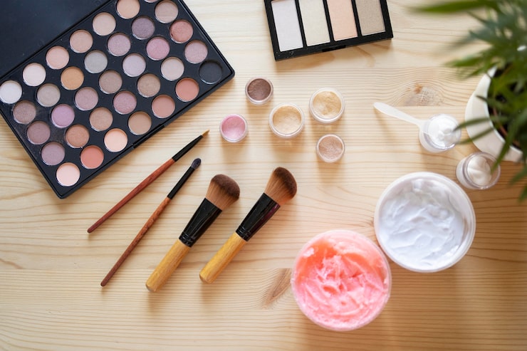 Makeup kit essentials for peach lipstick tutorial including lip scrub and brush