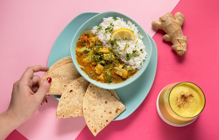 Healthy Indian meal plate with roti, dal, sabzi, and salad for weight loss.