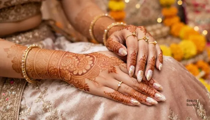 Modern bridal nail art designs perfectly paired with traditional Indian Mehendi patterns. Modern bridal nail art designs perfectly paired with traditional Indian Mehendi patterns.